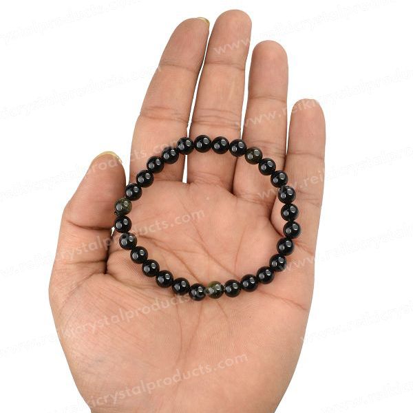 Clear bead bracelet is naturally cold. Black bracelet has a little Buddha  head. What are they made of and do they hold any significance (religious,  spiritual, etc) thank you!! : r/whatisthisthing